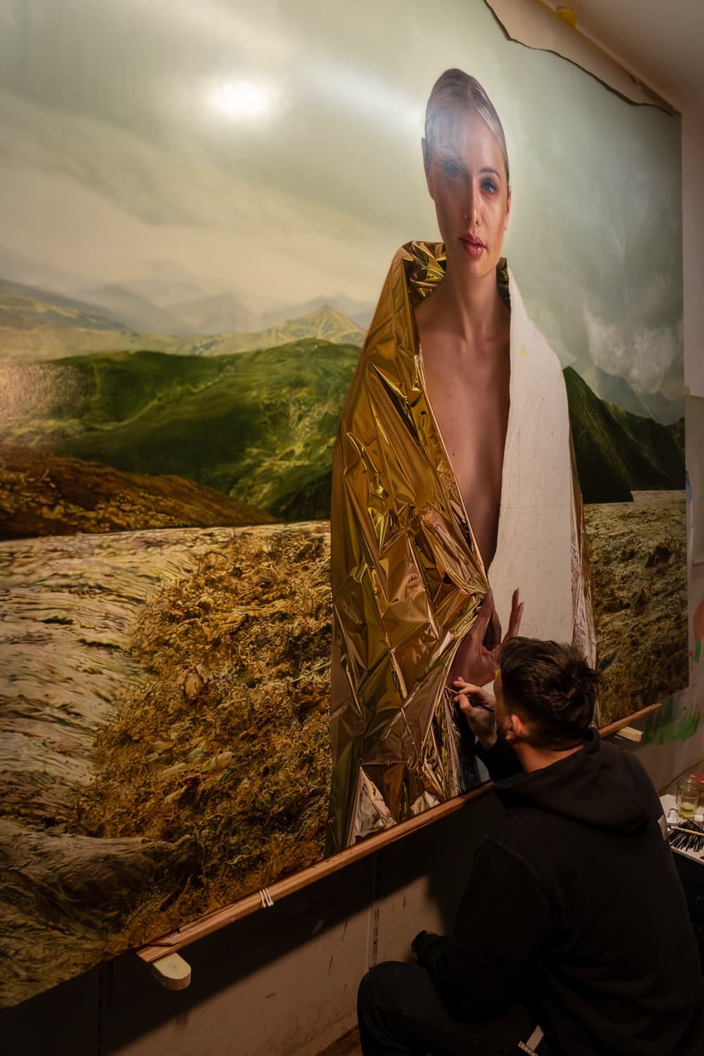 Sebastian Nasta painting the monumental work in the studio