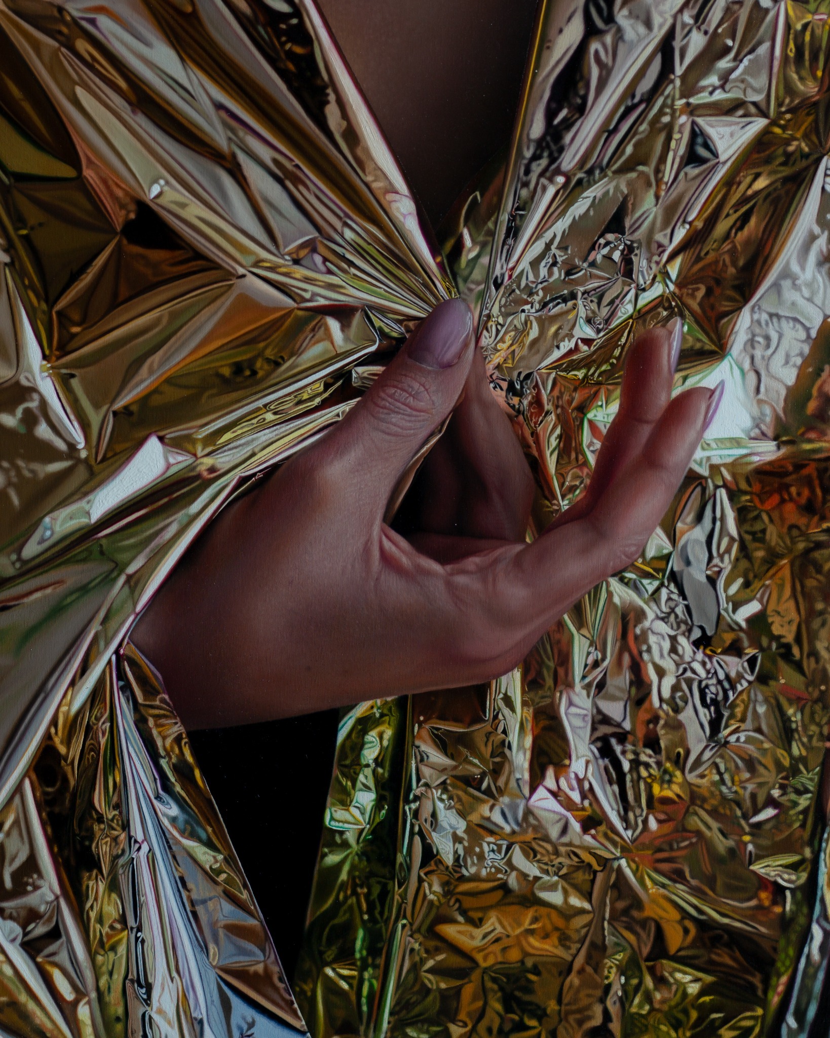 Detail of the painted hand and reflective gold material